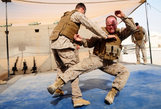Martial arts videos. One soldier uses a martial arts throw on another
